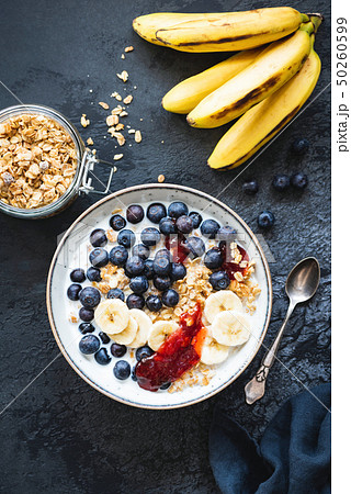 Breakfast bowl with berries, granola, yogurt 50260599