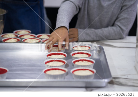 hand of asia kid boy making a cake hand of asia kid boy making a cake 50263525