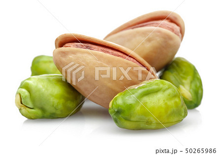 Group of pistachio nuts isolated on white Group of pistachio nuts isolated on white 50265986