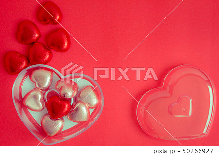 Red background with heart rests in the concept of 50266927