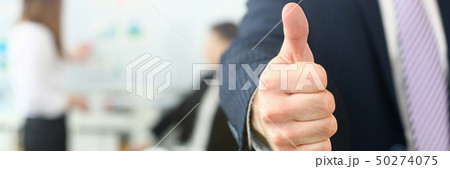 Male arm show OK or confirm during conference in office Male arm show OK or confirm during conference in office 50274075