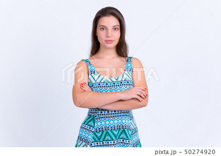Portrait of young beautiful woman with arms crossed 50274920