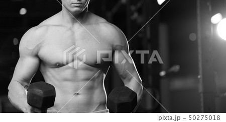 Shirtless Athletic Young Man With Dumbbells Shirtless Athletic Young Man With Dumbbells 50275018
