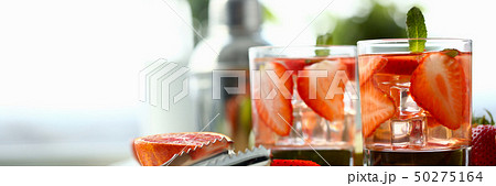 Strawberry punch home made cocktail closeup 50275164