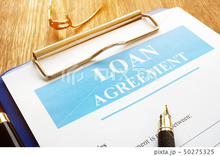 Loan agreement form with clipboard. 50275325