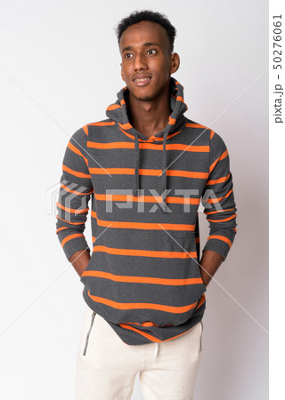 Portrait of young happy African man thinking Portrait of young happy African man thinking 50276061
