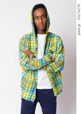 Young handsome African hipster man wearing hoodie with arms crossed 50276276