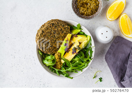 Green avocado salad with green vegan cutlet Green avocado salad with green vegan cutlet 50276470