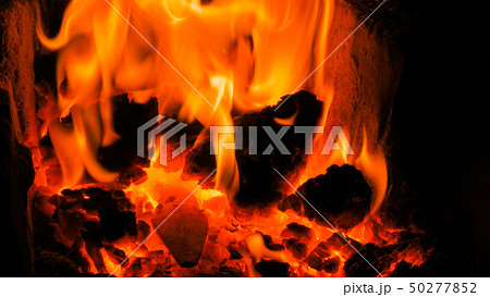 Burning fire in furnace Burning fire in furnace 50277852