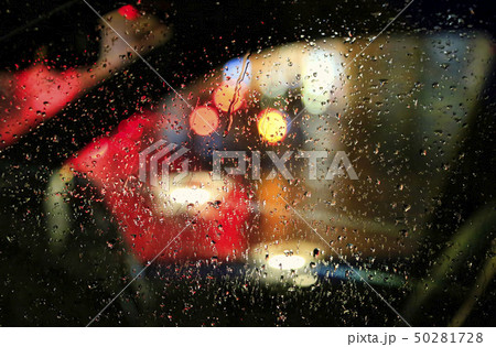 Lights of night city through the glass of the car 50281728