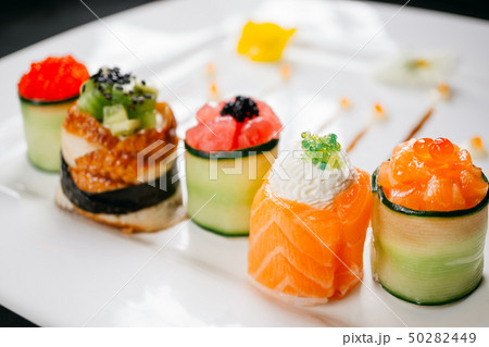 Set of Japanese delicacy,  sushi rolls on slate 50282449