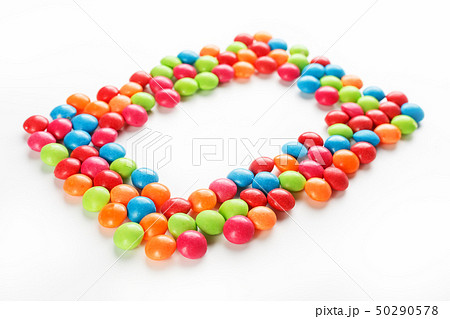 Frame of multi-colored candies close up. Rainbow 50290578