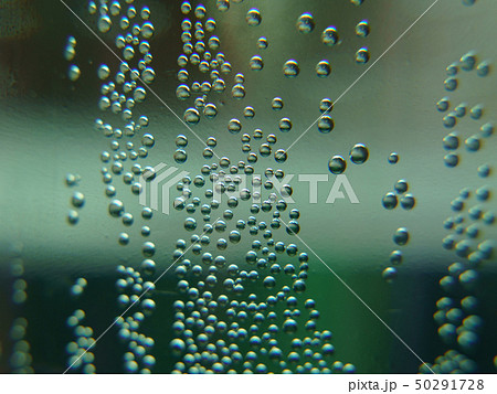 Movable, active bubbles in mineral water 50291728
