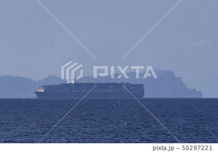 春の北海道松前町白神岬から津軽海峡を行きかう貨物船と津軽半島そして残雪の岩木山の風景を撮影 50297221