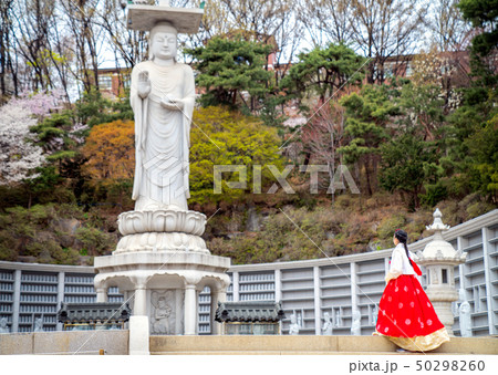 Korean lady in Hanbok dress in Bongeunsa temple Korean lady in Hanbok dress in Bongeunsa temple 50298260