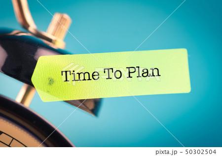word TIME TO PLAN on yellow sticky paper word TIME TO PLAN on yellow sticky paper 50302504