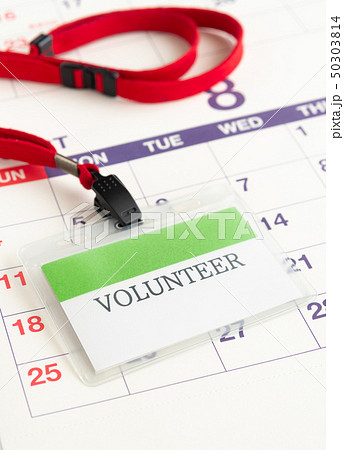 Volunteer ボランティア カレンダー ネームプレート 名札の写真素材