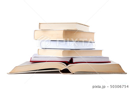 Stack of open and closed hardback books isolated 50306754
