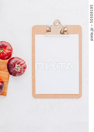 Tomatoes Mar Azul on white wooden table background Tomatoes Mar Azul on white wooden table background 50309195