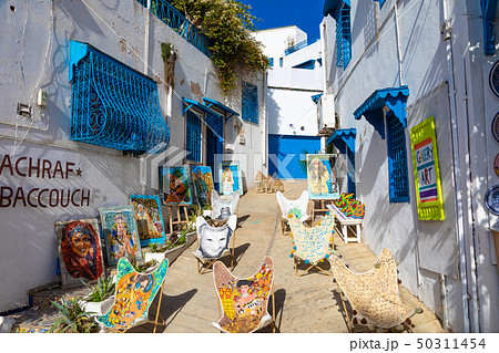 Cityscape with typical white blue colored houses Cityscape with typical white blue colored houses 50311454