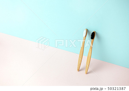 Couple of Bamboo tooth brush on pink blue 3d Couple of Bamboo tooth brush on pink blue 3d 50321387