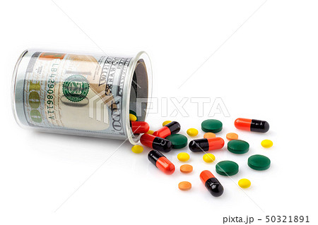 Colorful pills spilled from a bottle made of 50321891