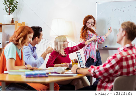 Positive joyful people working together in team Positive joyful people working together in team 50323235