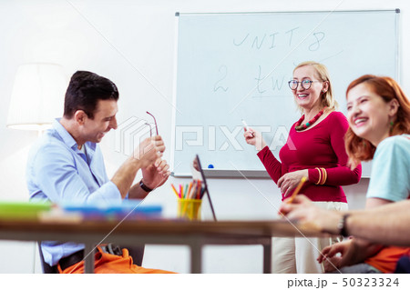 Cheerful nice people having fun during their class Cheerful nice people having fun during their class 50323324