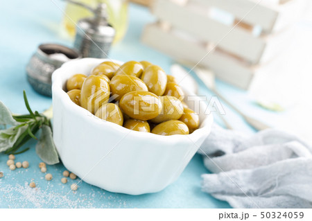 Green olives in a bowl 50324059