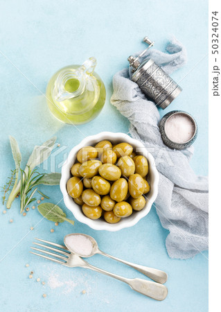Green olives in a bowl 50324074
