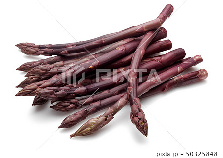 Purple asparagus sticks isolated on white 50325848