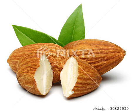 Group of almonds with leaves isolated on white 50325939
