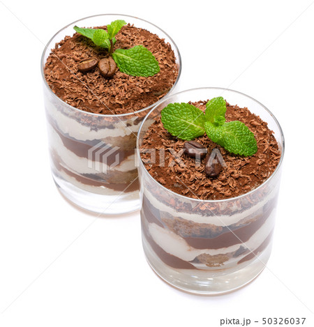 two portions Classic tiramisu dessert in a glass isolated on a white background 50326037