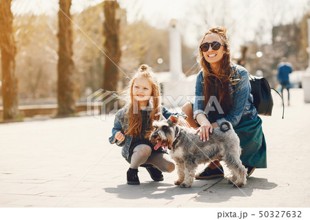 stylish mother with daughter 50327632