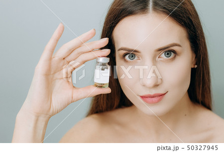 woman beautiful skin drug bottle youth liquid woman beautiful skin drug bottle youth liquid 50327945