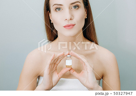 woman beautiful skin drug bottle youth liquid woman beautiful skin drug bottle youth liquid 50327947
