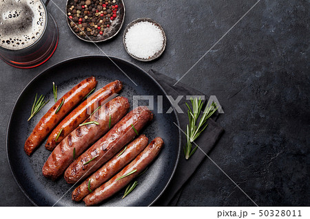 Grilled sausages and beer Grilled sausages and beer 50328011