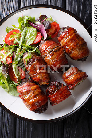 Smoked Armadillo eggs with jalapeno and cheese Smoked Armadillo eggs with jalapeno and cheese 50328598