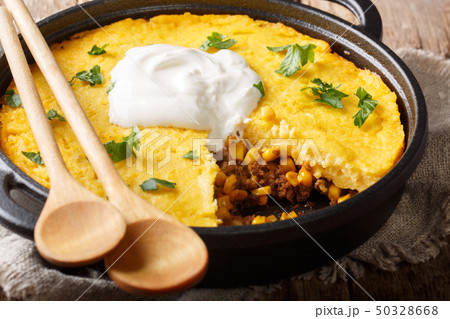 Tasty Tamale pie with corn and ground beef and 50328668