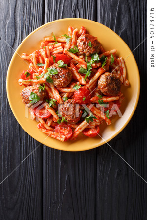 meatballs with a side dish of pasta Casarecce in 50328716