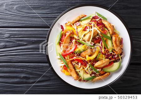 Asian cabbage salad with chicken and vegetables 50329453
