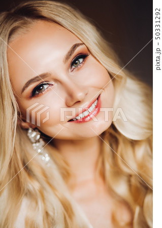 Sedactive and attractive blondie wearing makeup 50331292