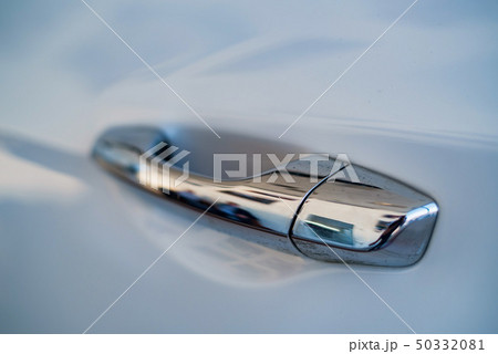 Modern car door handle with corrosion on it close Modern car door handle with corrosion on it close 50332081