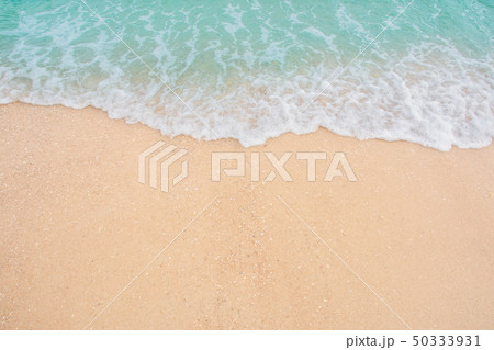 Soft wave of sea on empty sandy beach Background 50333931