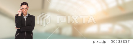 Serious Mixed Race Businesswoman Inside Building Serious Mixed Race Businesswoman Inside Building 50338857