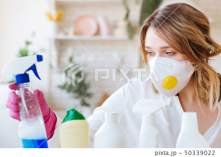 Nice blonde woman taking a cleansing agent 50339022