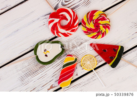 Composition with colorful lollipops, top view. Composition with colorful lollipops, top view. 50339876