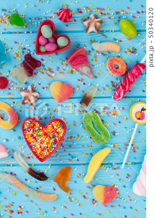 Composition with different yummy candies, top view. 50340120