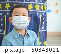 Little boy wearing protective mask protection from 50343011