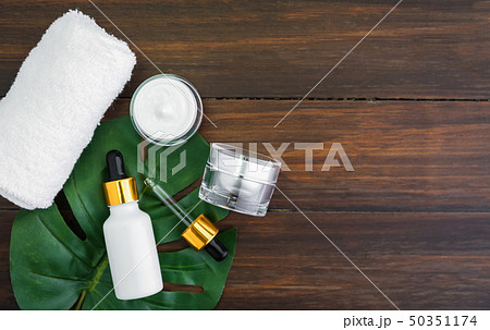 Cream bottle set and serum, mockup of beauty. Cream bottle set and serum, mockup of beauty. 50351174
